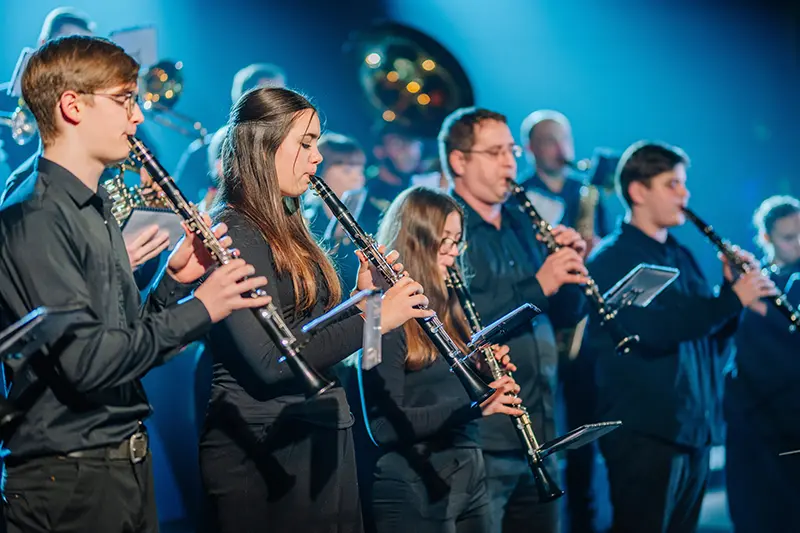 Musicians of a wind band during a performance